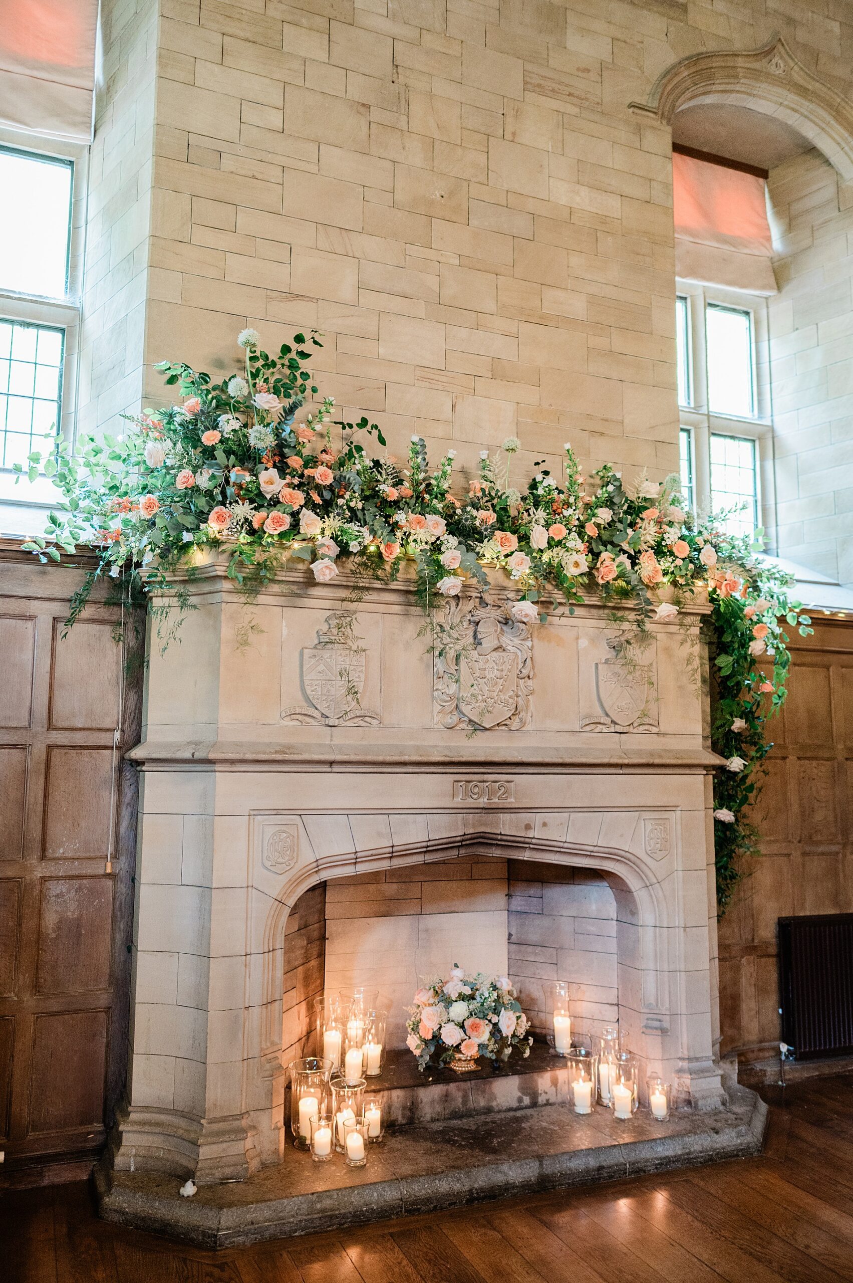 elegant florals decorate fireplace mantle 
