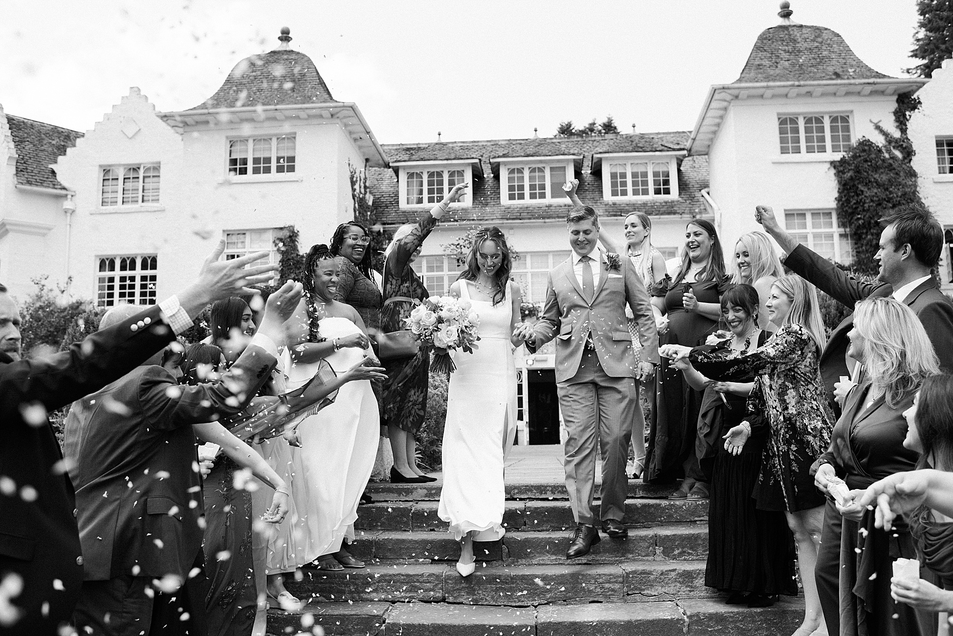timeless wedding Portraits of newlyweds exiting ceremony 