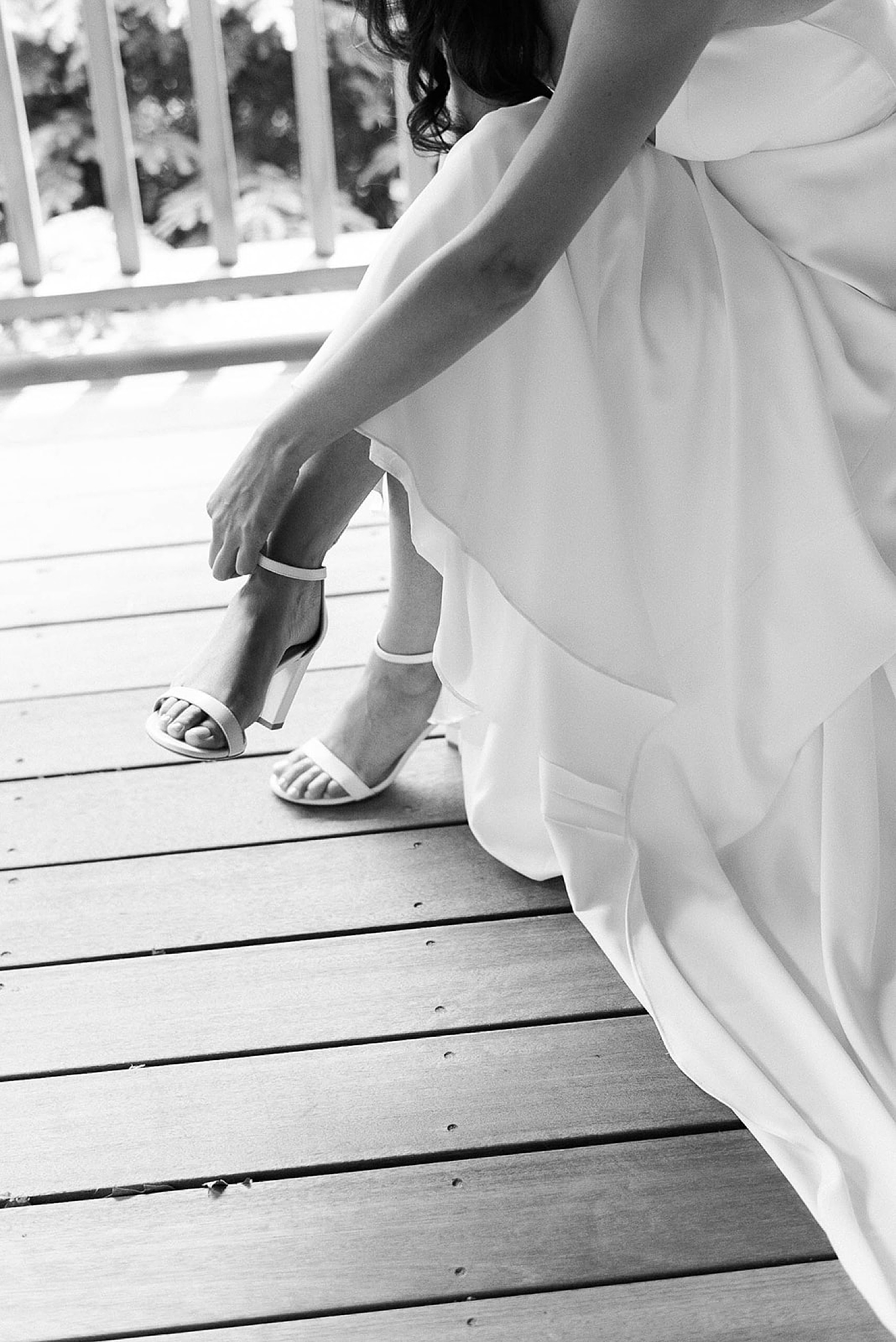 bride putting on shoes
