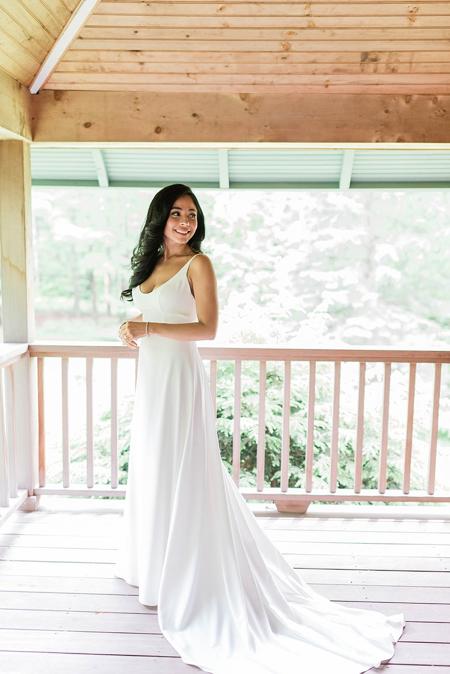 bridal portraits on porch at Deer Mountain Inn