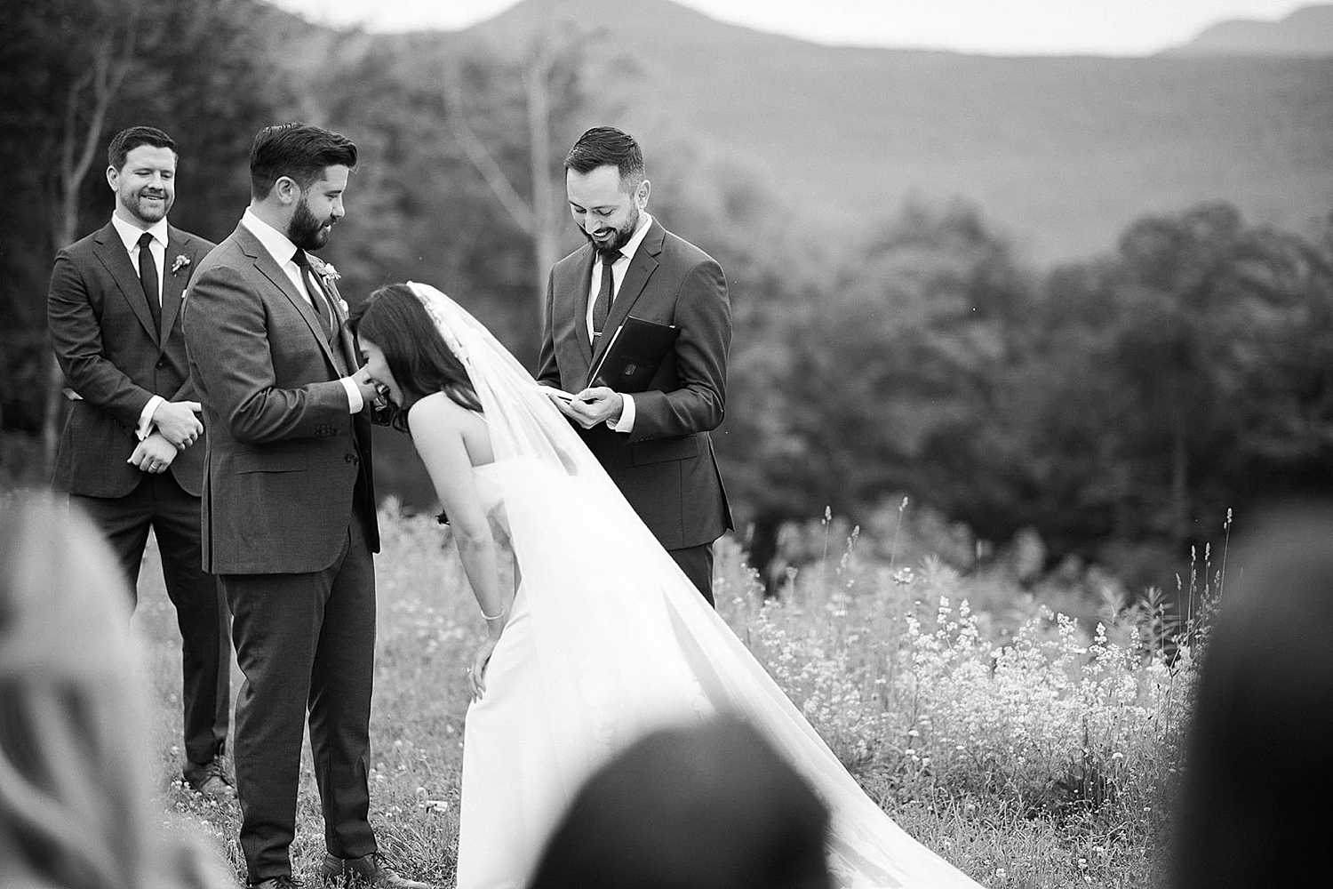 candid portraits of bride laughing during wedding ceremony