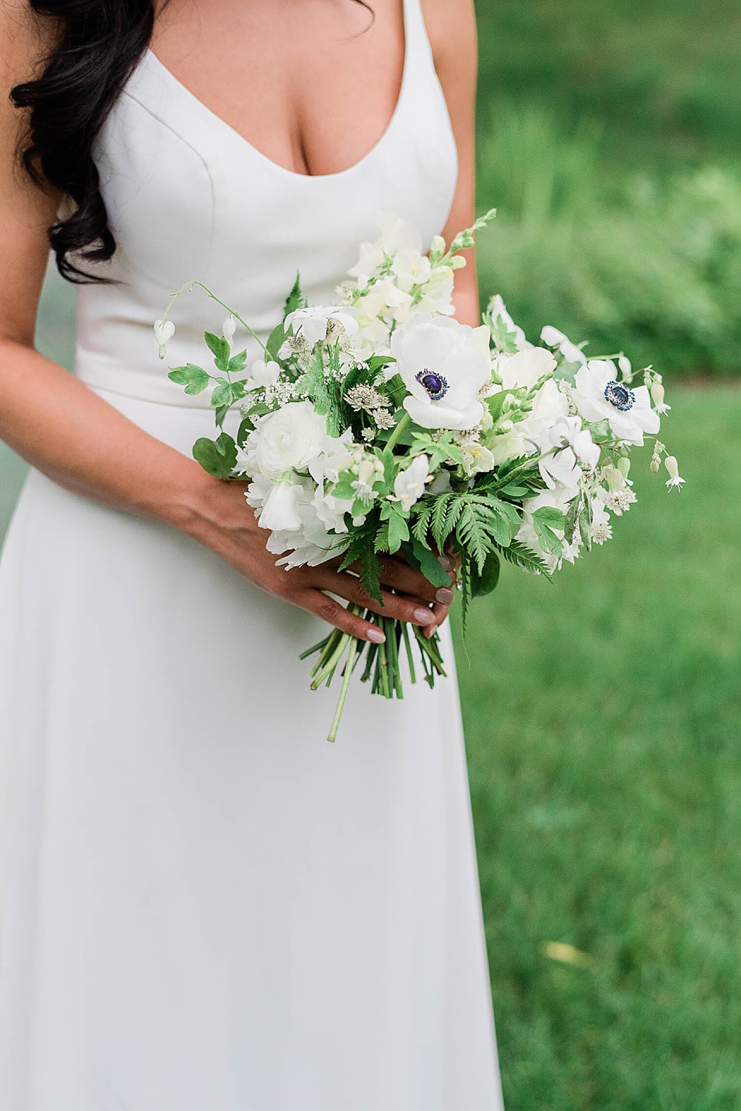 bridal bouquet of white flowers and greenery