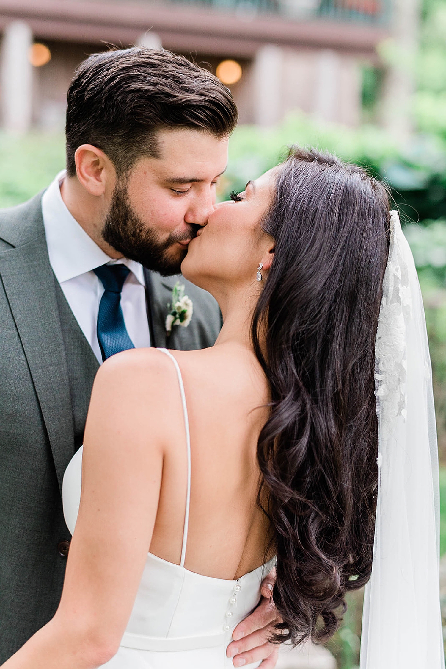 bride and groom kiss