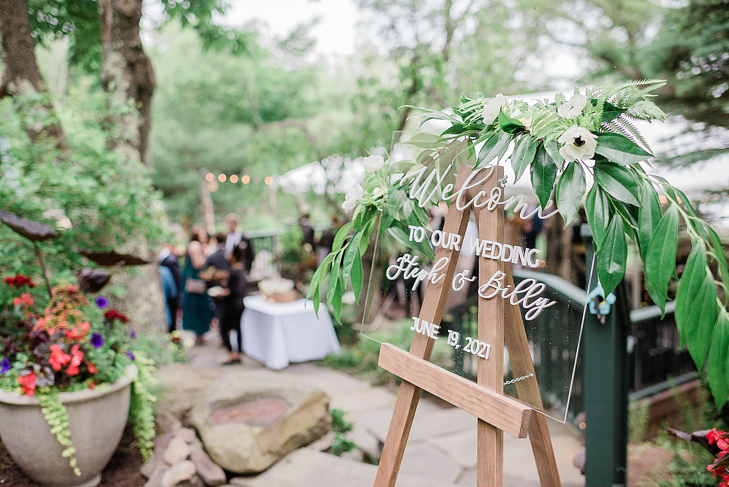 wedding welcome sign at cocktail hour
