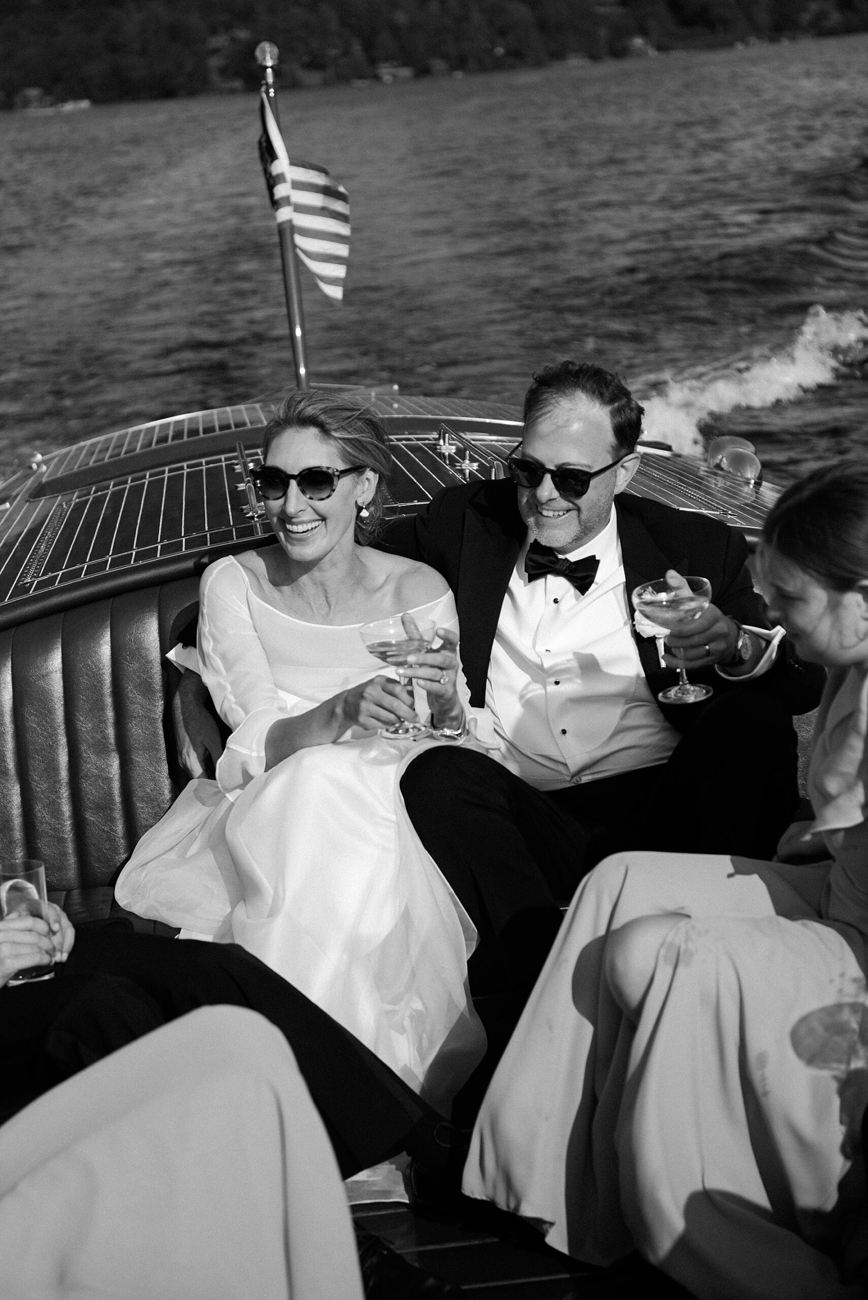newlyweds on a boat ride with their kids