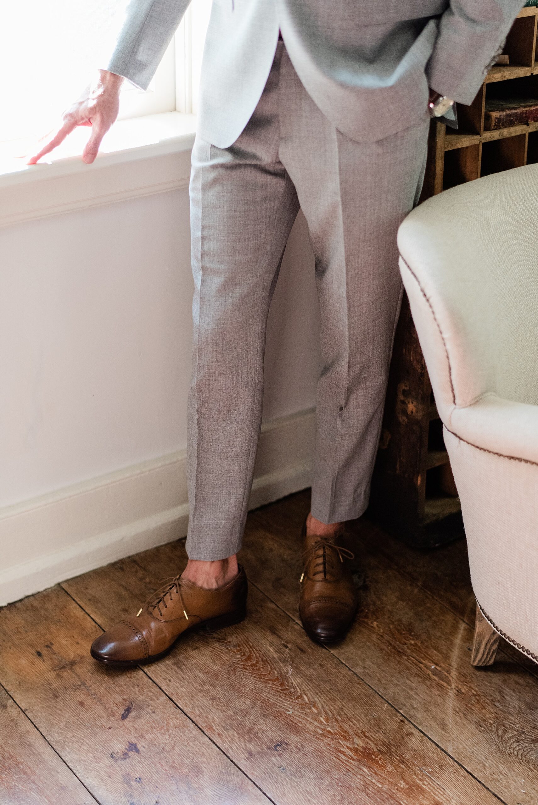 gray suit with tan shoes