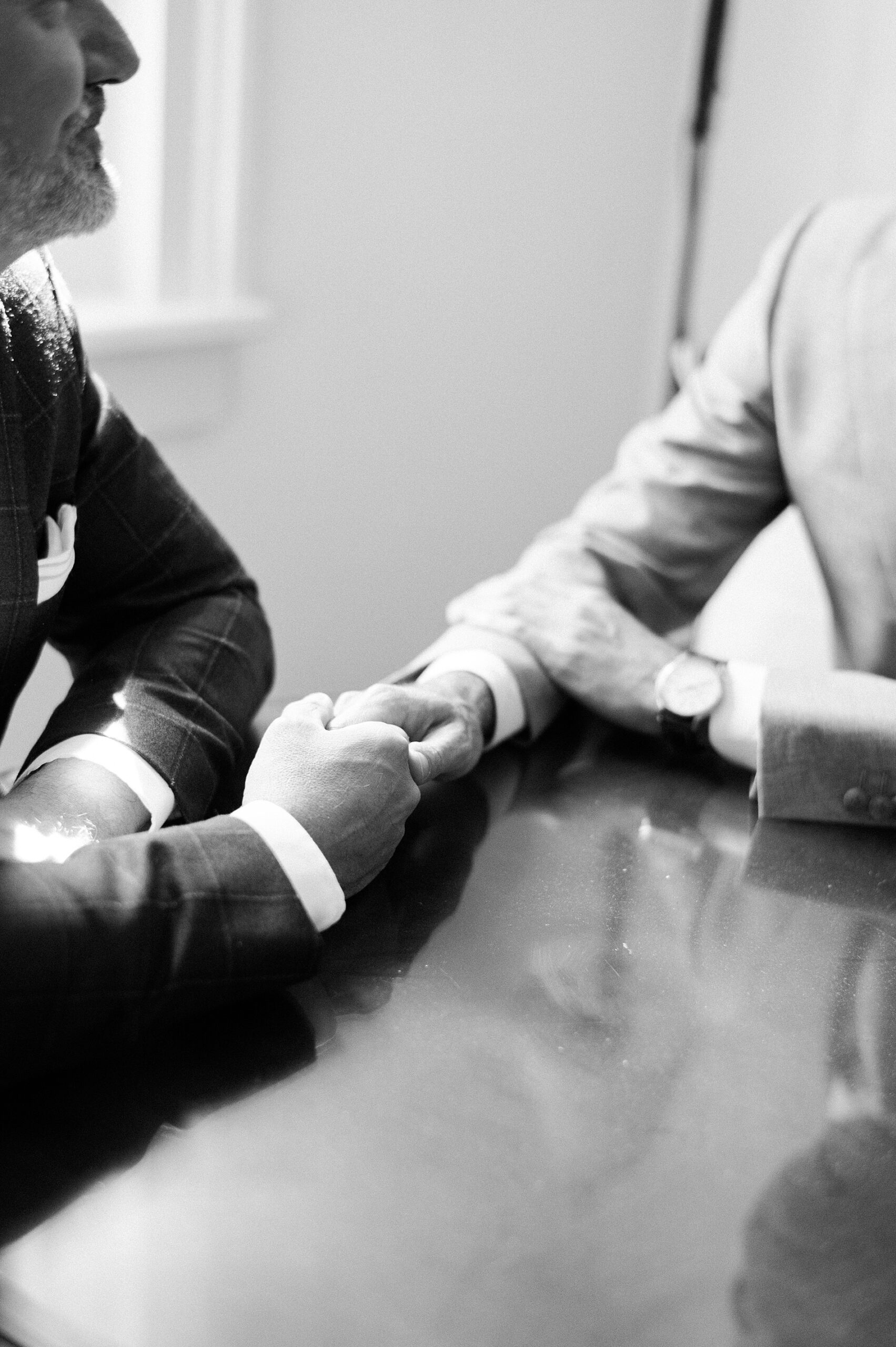 grooms share intimate moment together