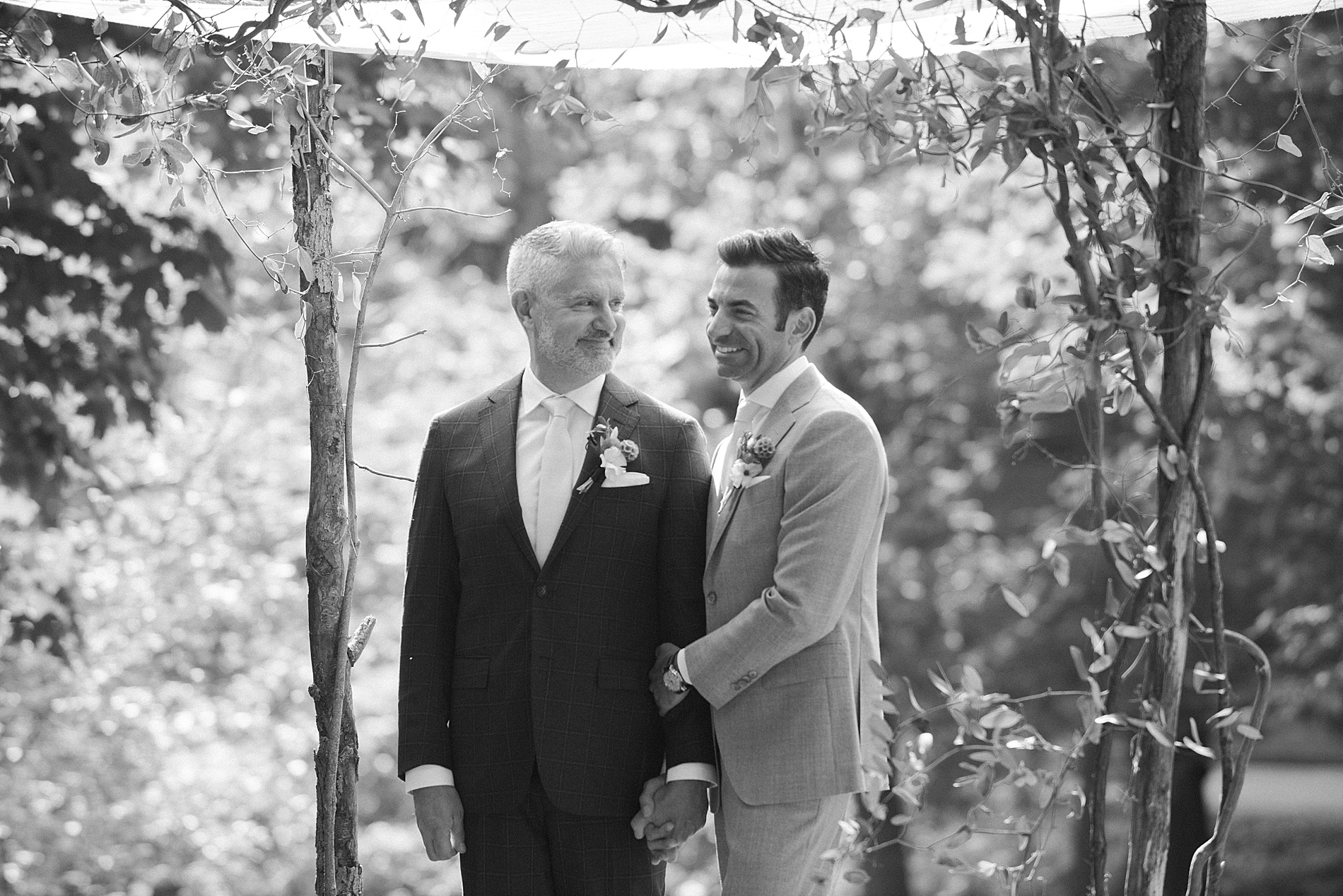 timeless portraits of grooms at wedding ceremony