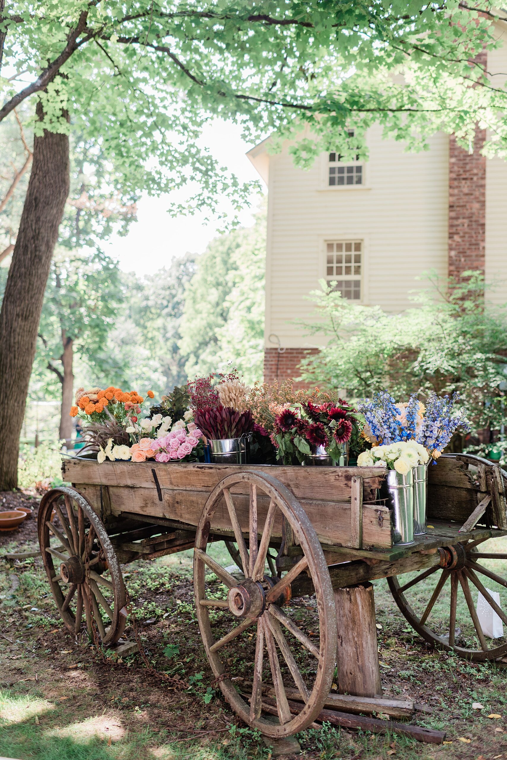 wooden wagon filled with flowers