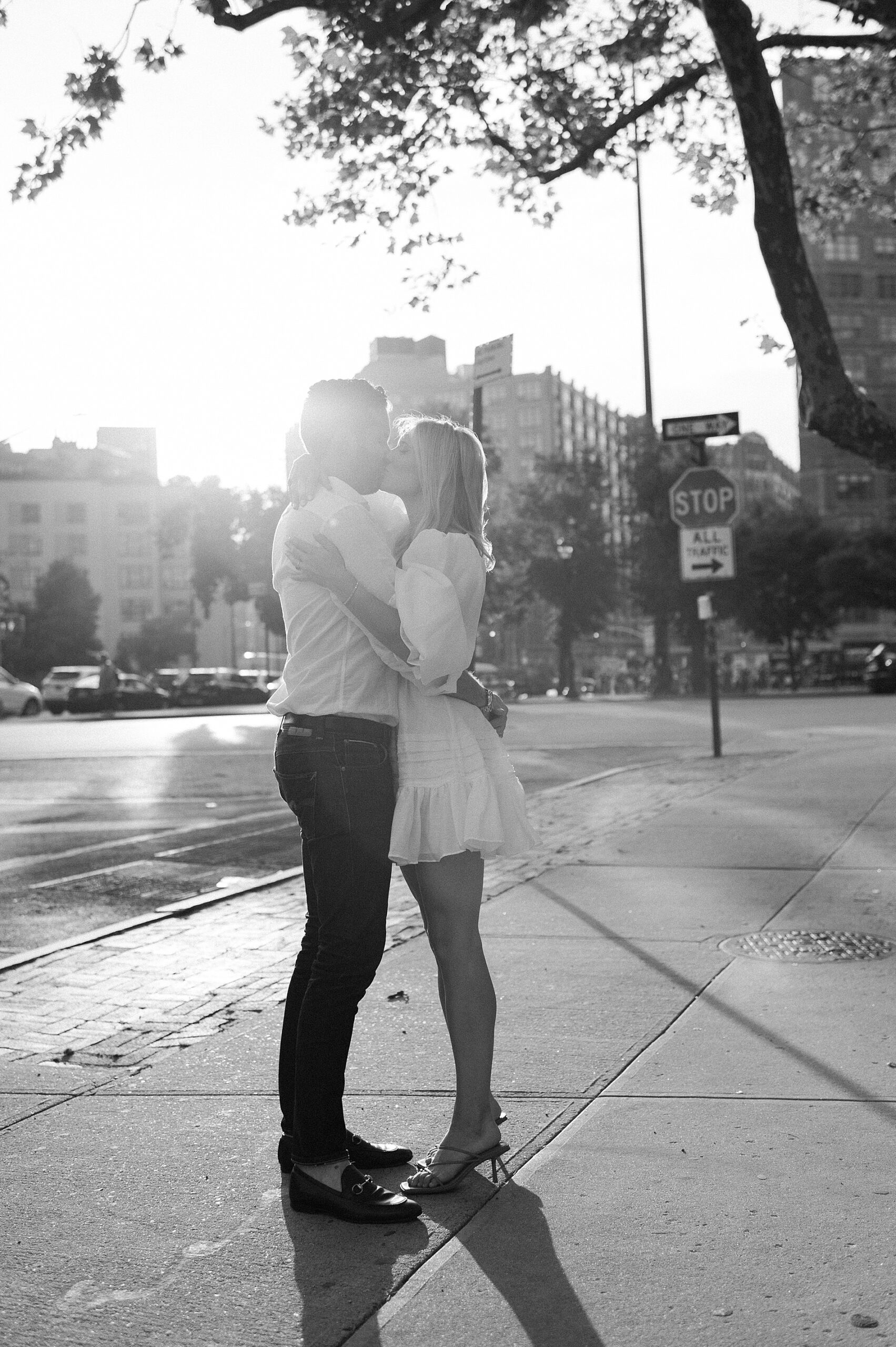 couple kiss on street in SoHo