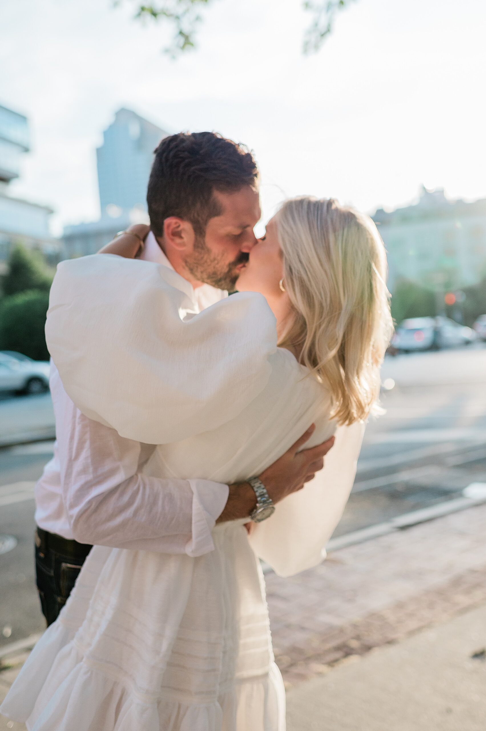 couple kiss during engagement session in SoHo NYC