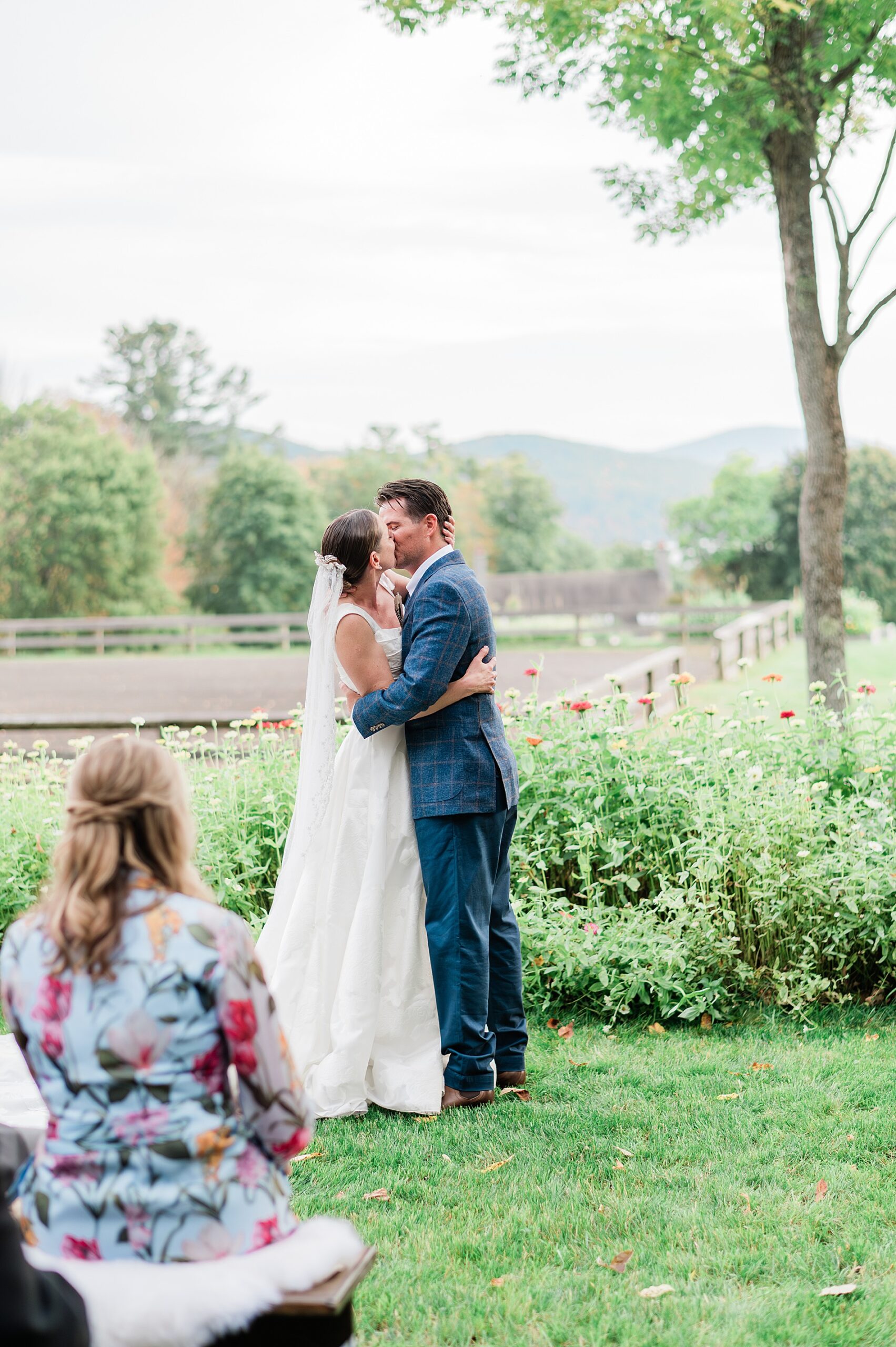 newlyweds kiss at wedding ceremony