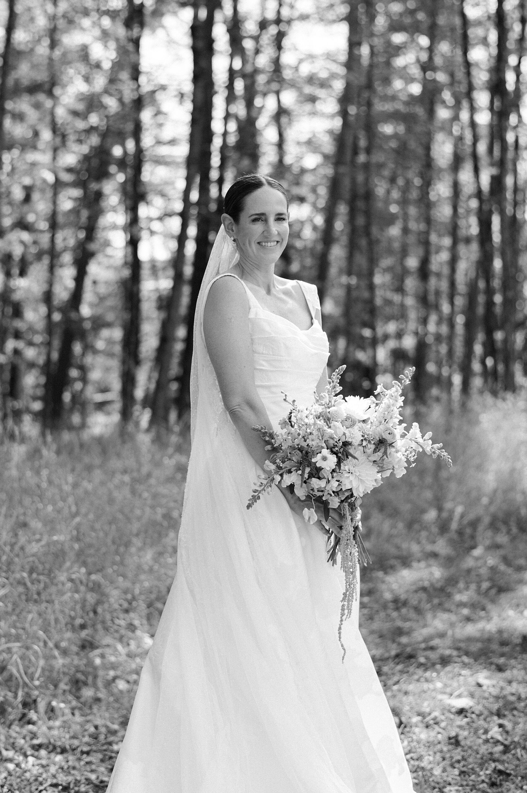 timeless bridal portraits in wooded area of private property