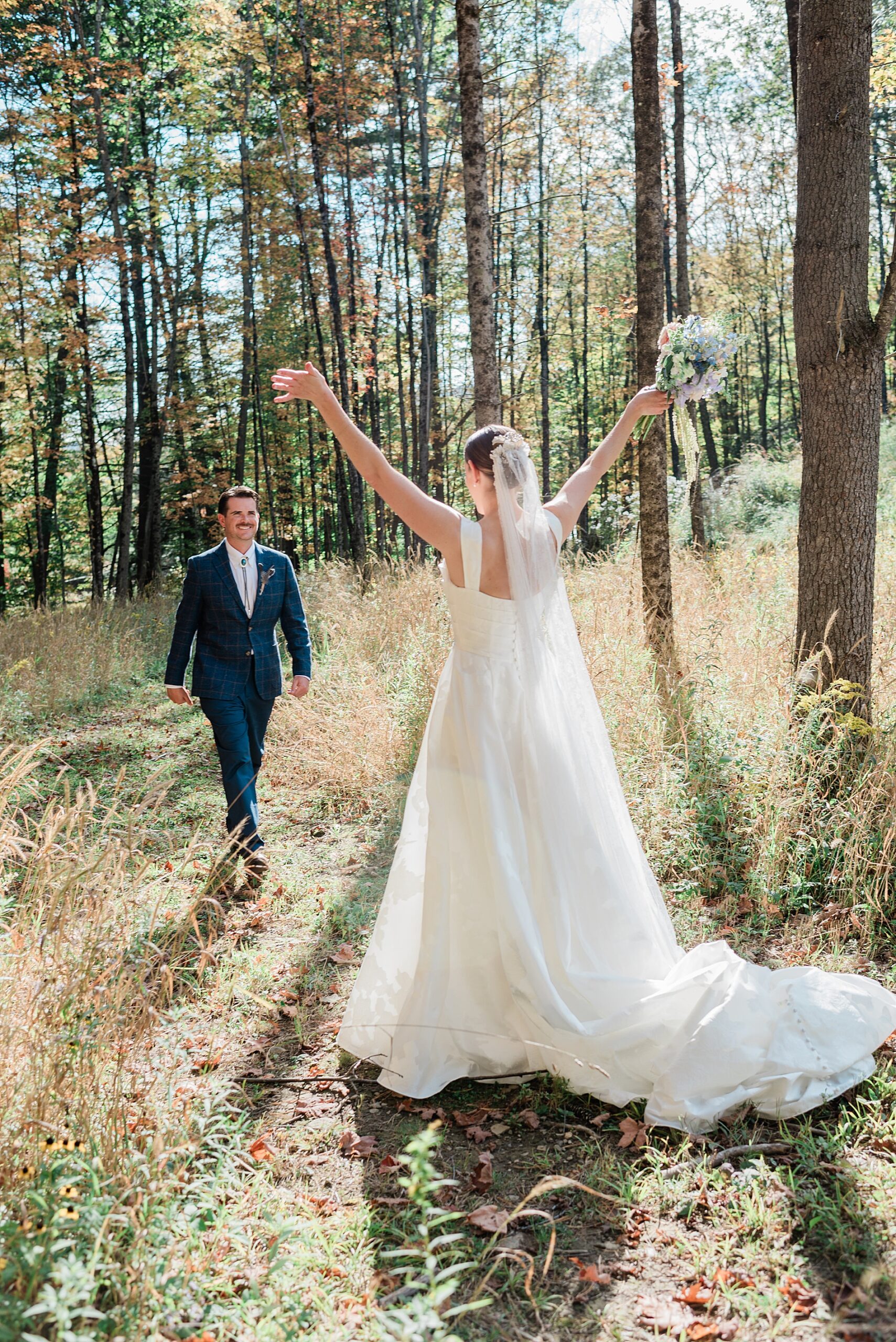 candid first look between bride and groom