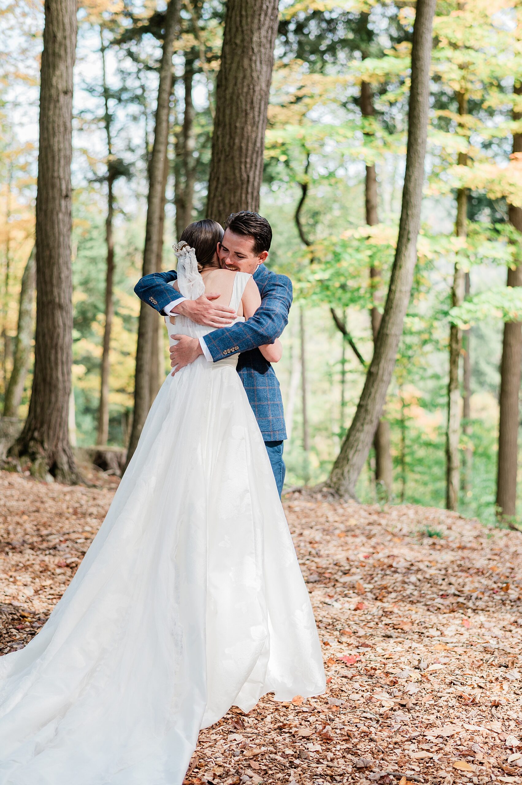 bride and groom hug during their first look