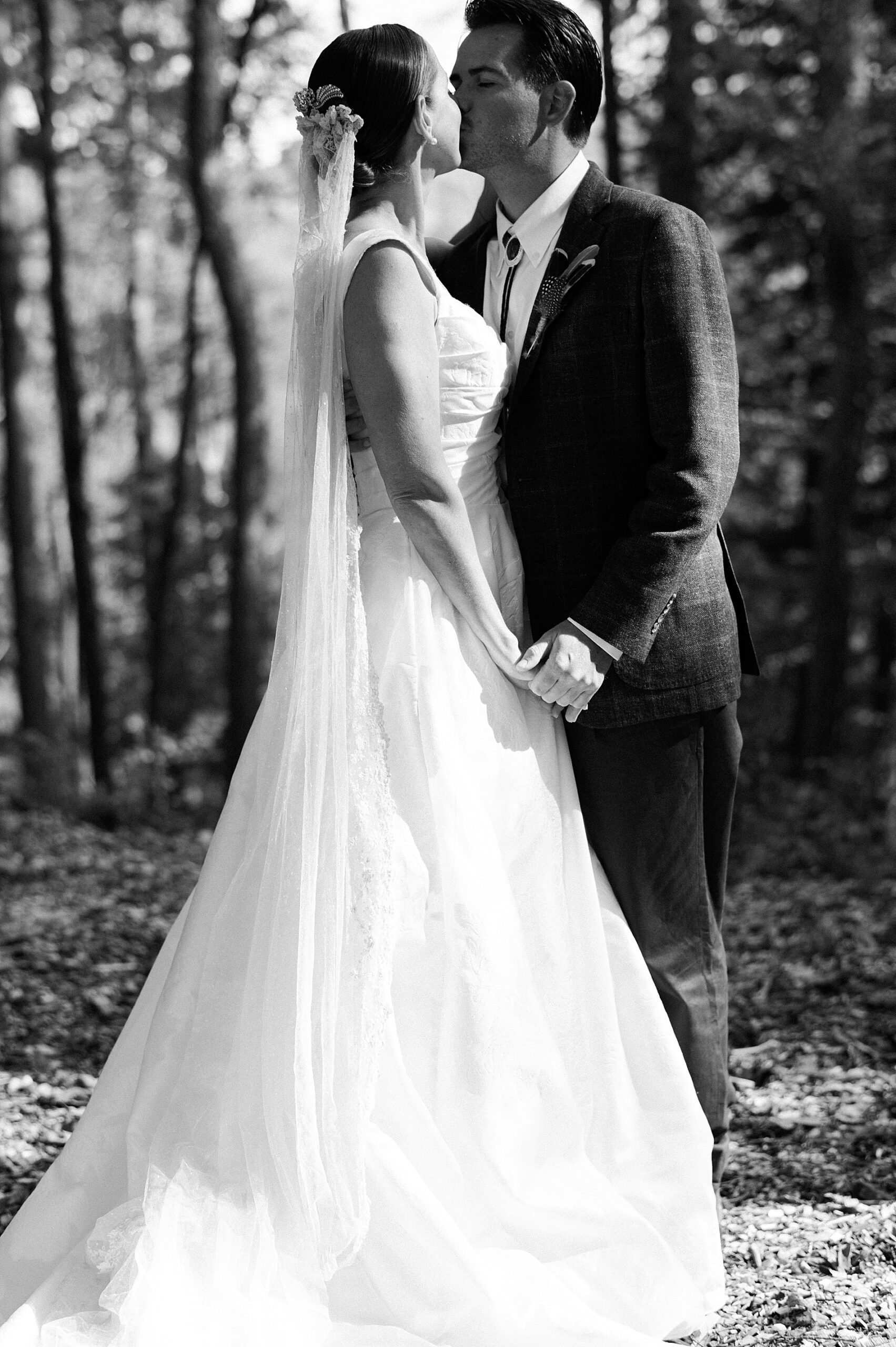bride and groom kiss during NY wedding
