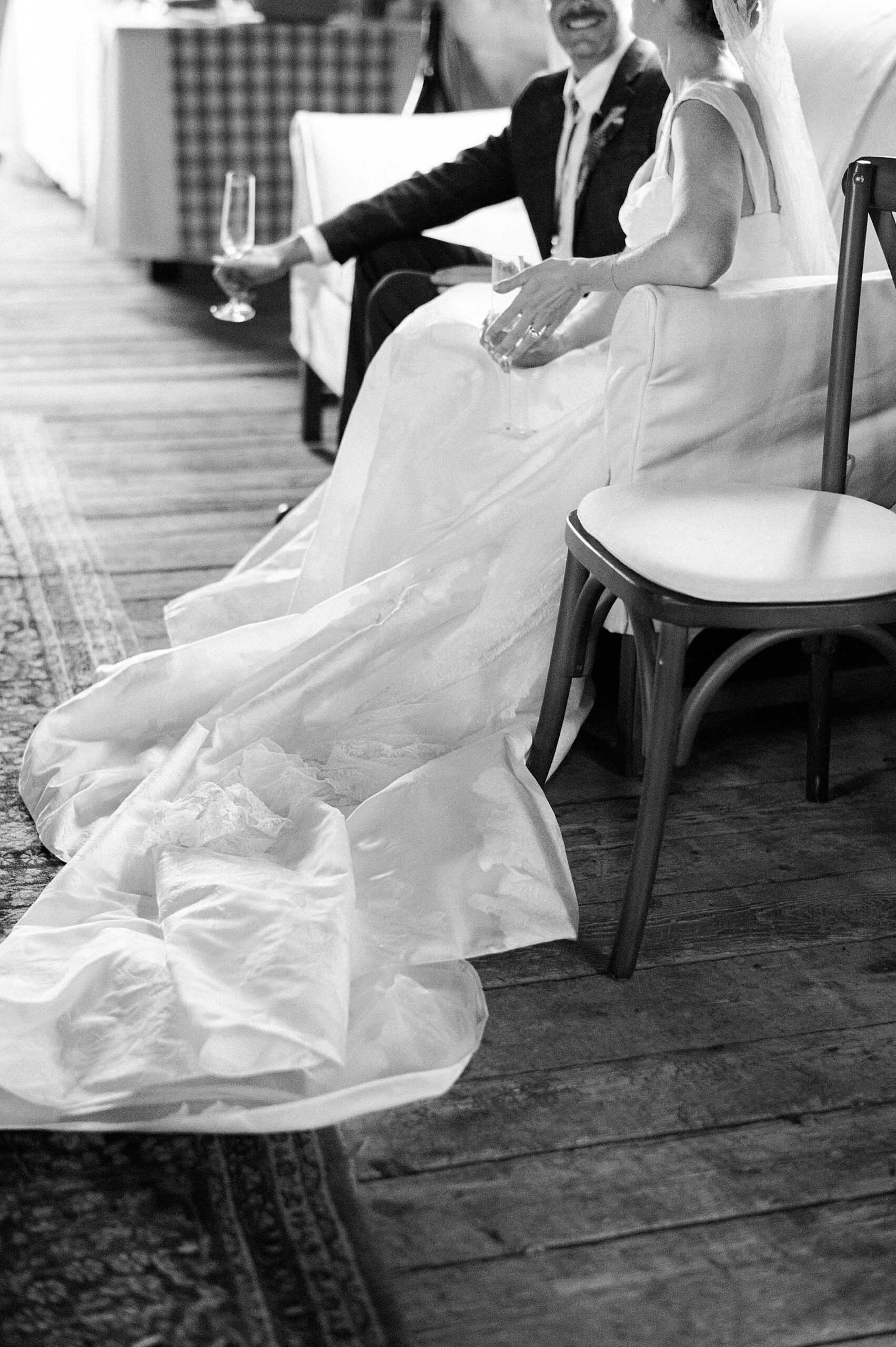 bride and groom celebrate wedding with champagne