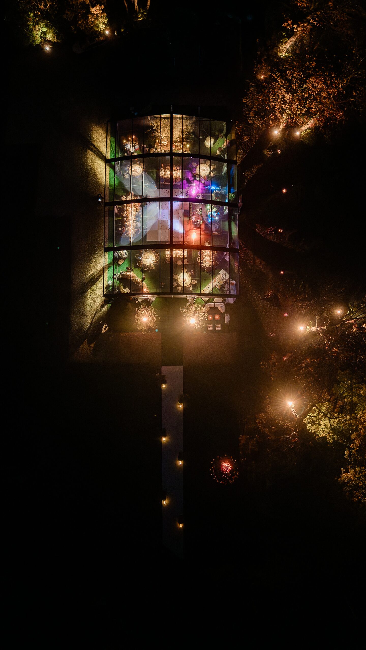 lights from tented reception at night
