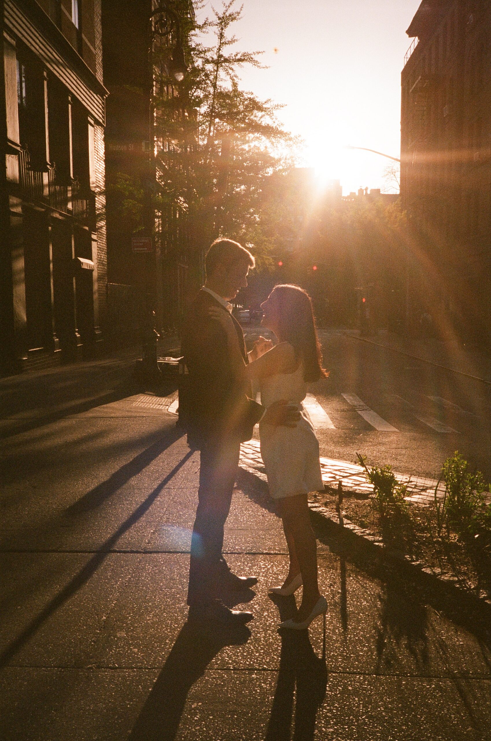 couple in West Village neighborhood for engagement photos