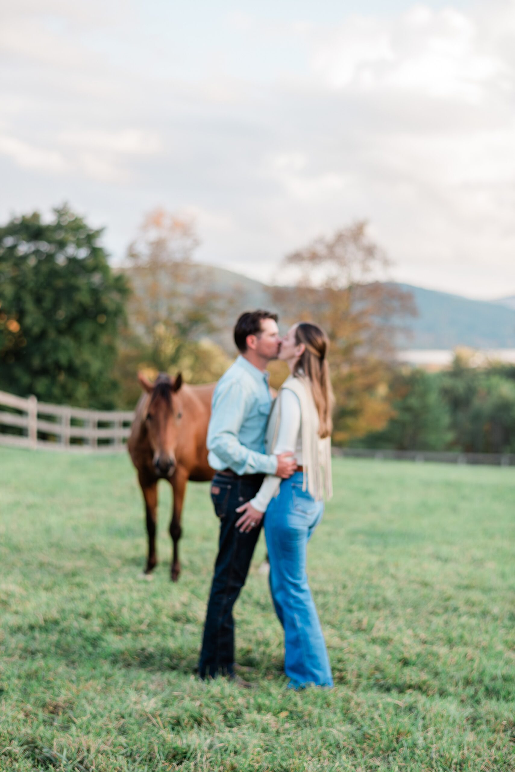 romantic couple portraits in pasture on family property in Cooperstown, NY