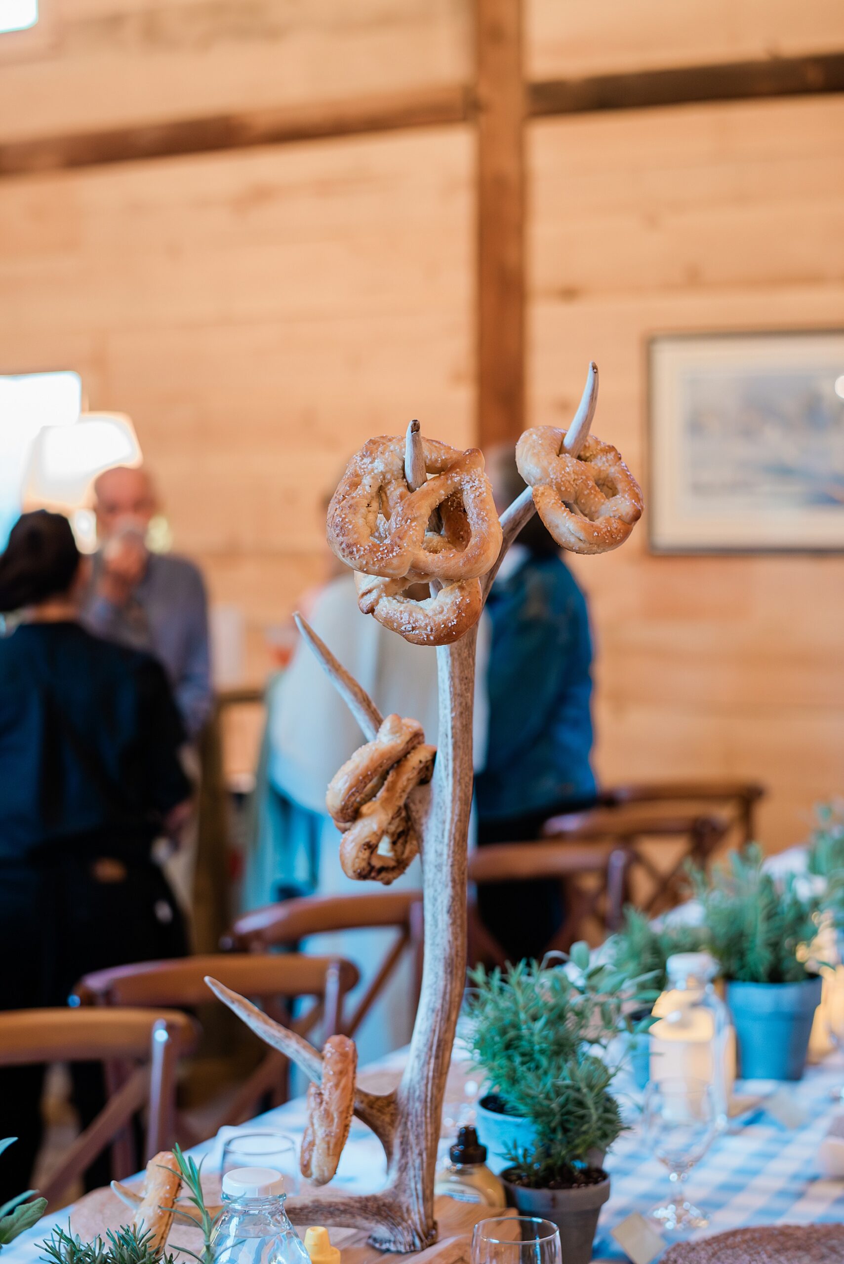 soft pretzels hang off of antlers 