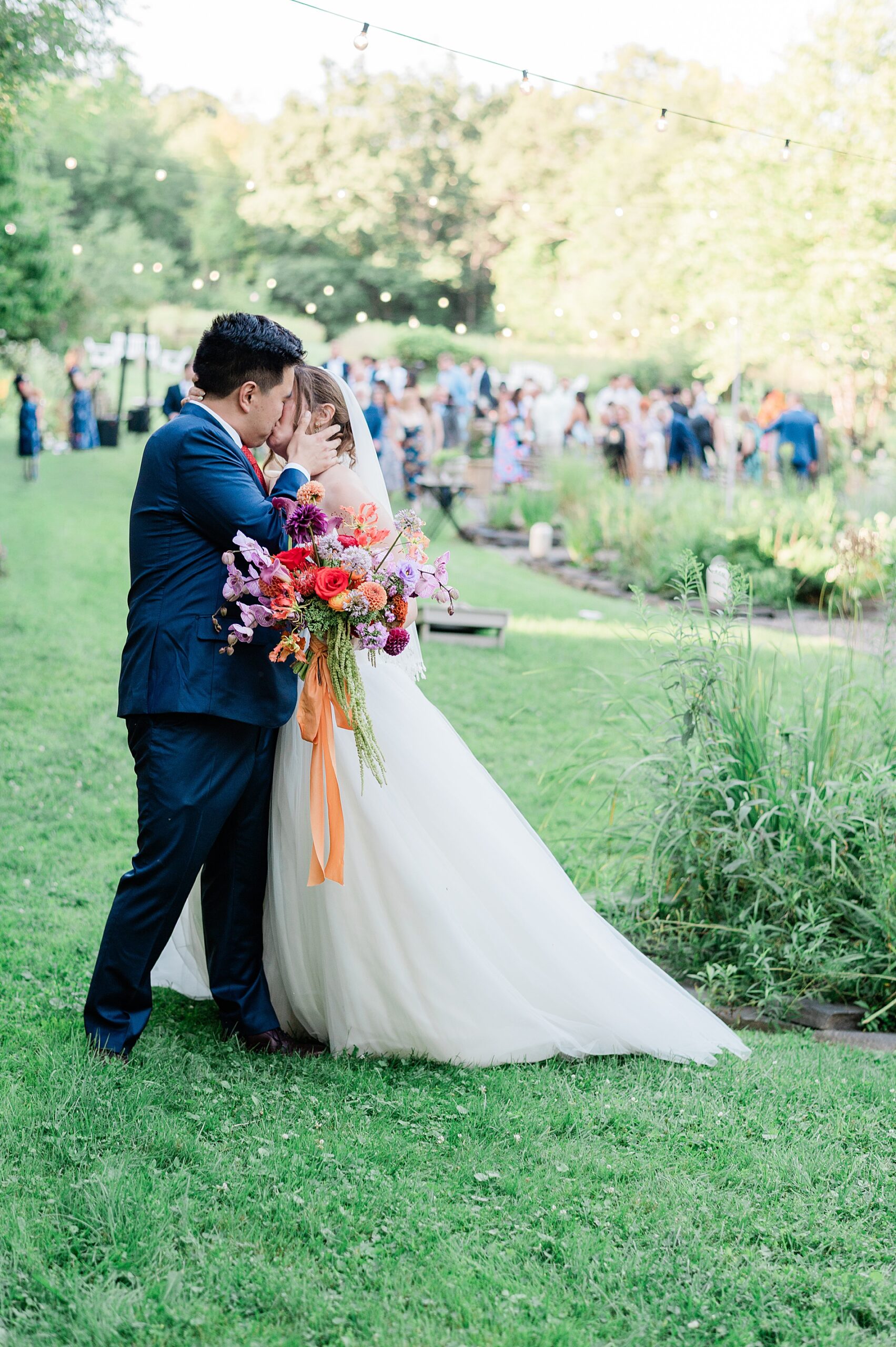 newlyweds kiss after wedding