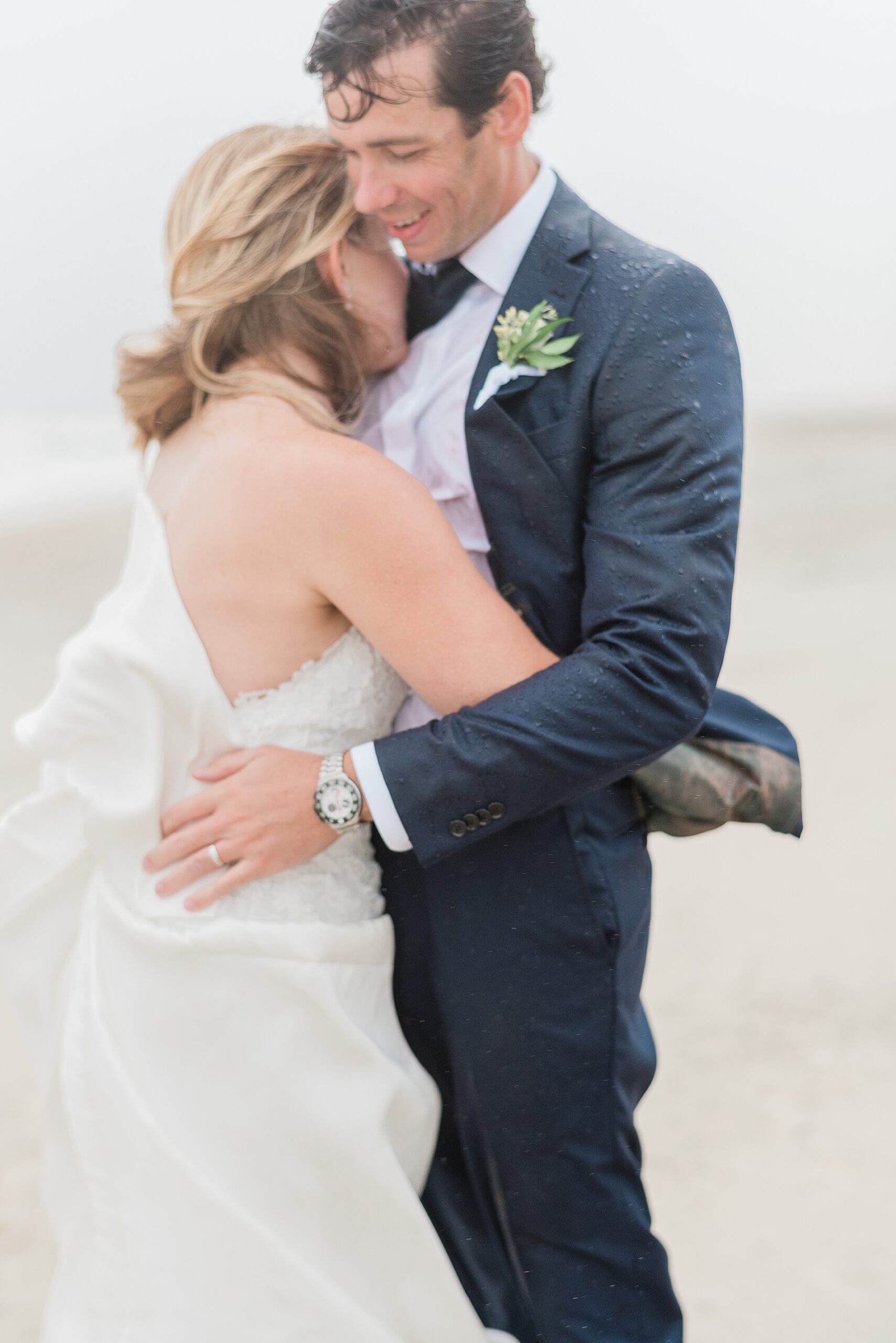 Rainy Spring Lake Wedding photos on the beach